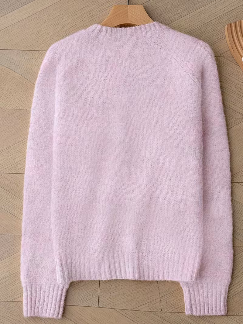 Trui van een zachte mohairmix voor dames - Voorzien van een Franse raglanboord en een drop shoulder design.