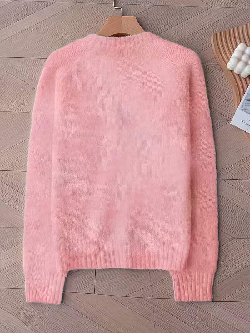 Trui van een zachte mohairmix voor dames - Voorzien van een Franse raglanboord en een drop shoulder design.