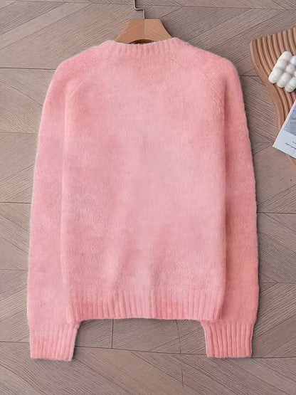 Trui van een zachte mohairmix voor dames - Voorzien van een Franse raglanboord en een drop shoulder design.