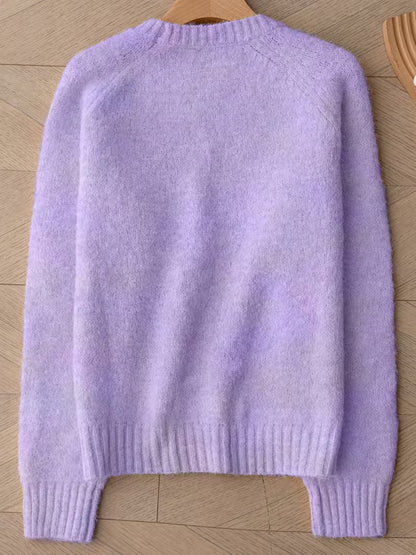 Trui van een zachte mohairmix voor dames - Voorzien van een Franse raglanboord en een drop shoulder design.