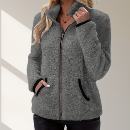 Nieuw modieus casual damesjack met contrasterende kleur, pluche rits en zak. Het is een warme, comfortabele jack met lange mouwen.